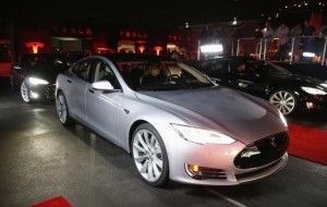 New all-wheel-drive versions of the Tesla Model S car are lined up for test drives in Hawthorne, California