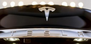 A Tesla logo adorns a 'Model S' car in the dealership in Berlin