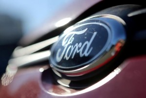 FILE PHOTO: The Ford logo is seen on a car in a park lot in Sao Paulo